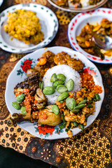 Nasi campur or Mixed Indonesian Rice with Tempe, sambal & pete.