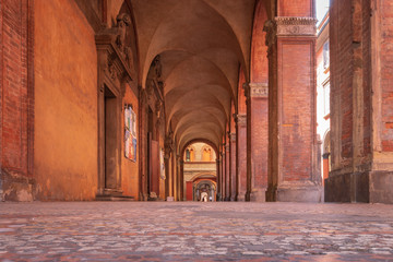 Arcades at Strada Maggiore in Bologna, Italy. - obrazy, fototapety, plakaty