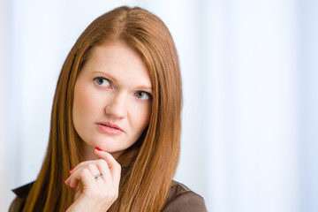 Redhead Woman Girl Thinking Thoughtfully with Natural White Background