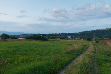 road leading to a village in the mountains