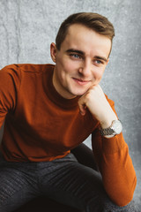 Portrait of a happy rich man. Portrait shot of an attractive, successful and happy young man male. Man's dimpled smile
