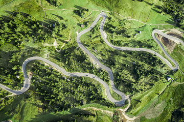 Top down view of winding road in Dolomites