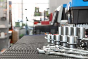 Car repair tools, wrench tool set on a black texture background