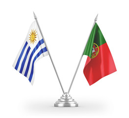 Portugal and Uruguay table flags isolated on white 3D rendering