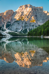 Mountains reflection on Lago di Braies in Dolomites, Italy