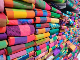 colorful fabrics for sale at market