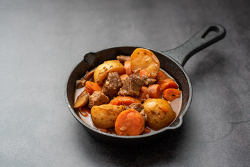 French cuisine Beef Bourguignon. Beef stew with red wine, carrots and potatoes. 