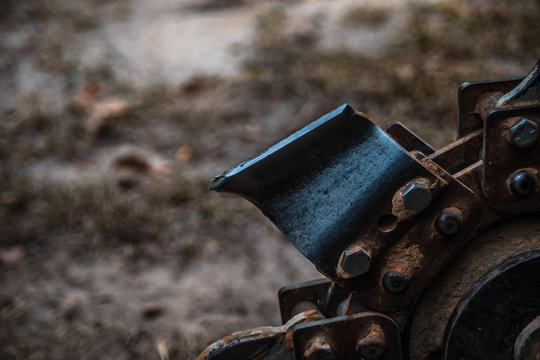 Close Up Shot Of The Digging Teeth On A Trenching Machine 