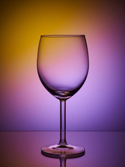Glass close-up neon colored light gradient background
