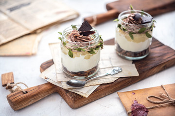 Granola with yoghurt on bright background