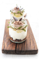 Granola with yoghurt on bright background