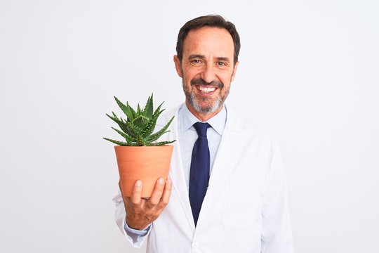 Middle Age Scientist Man Holding Cactus Plant Pot Standing Over Isolated White Background With A Happy Face Standing And Smiling With A Confident Smile Showing Teeth