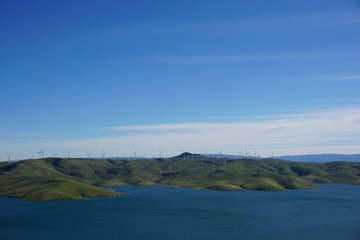 green energy blue lake blue sky