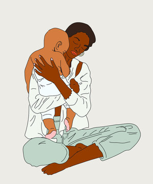 Black ethnic woman holding a baby. Motherhood. Mother and child.