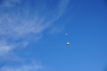 moon is a ball yellow ball white moon