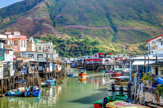 Homes and shops on stilts along the shores of Tai O fishing village on Lantau Island in Hong Kong. 