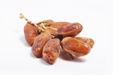 Macro shot of Tunisian dates / Phoenix dactylifera on a white isolated background
