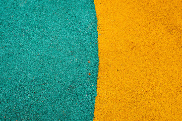 Green and yellow bright soft rubber flooring safe for sports and workout or on the playground from...
