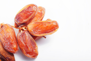 Macro shot of Tunisian dates / Phoenix dactylifera on a white isolated background