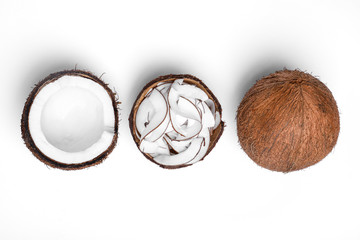 Composition with fresh coconut flakes on white background, top view