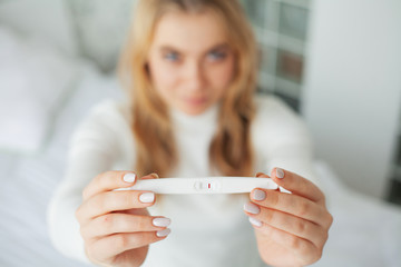 Woman feels frustrated about negative test of pregnancy