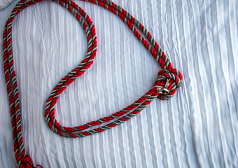 Tying the knot with love and matrimony on Valentine's Day. Bokeh effect.