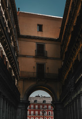 Fototapeta premium Nice view of the entrance to Plaza Mayor in the city of Madrid ,Spain with the typicall balconies and windows on facade buildings