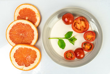 citrus fruits on white background
