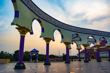 Semarang, Indonesia - CIRCA Nov 2019: The wall with arabic calligraphy and arch decoration in Great...