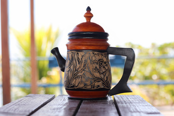 chinese teapot on wooden table