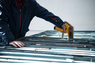 team of mining  workers measuring drilled rock core