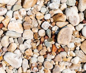 Beautiful texture of a group of colorful rocks and pebbles