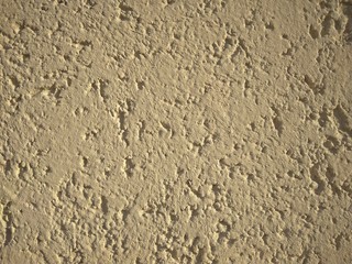 rough uneven surface with a sandy background texture