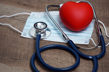 medical stethoscope and red heart