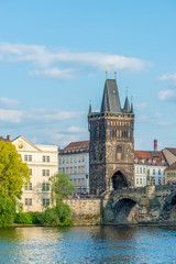 Scenic view of the Old Town pier architecture and Charles Bridge over Vltava river in Prague, Czech Republic