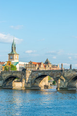 Fototapeta na wymiar Scenic view of the Old Town pier architecture and Charles Bridge over Vltava river in Prague, Czech Republic
