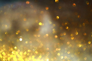 The abstract bokeh of bright glittering sheets that reflect sunlight.