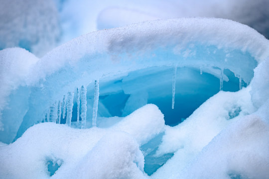 Frozen Geyser. Rock Of Ice With Smoke