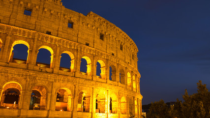 Fototapeta premium Colosseum in Rome at twilight , Italy