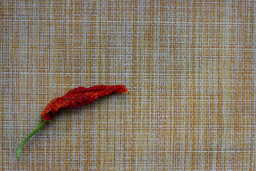 Dried Red Chili Peppers on a Cutting Board
