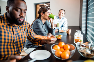 Attractive brunette girl drinking her aroma coffee