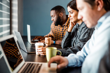 Kind brunette female sitting in semi position