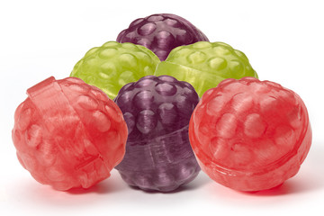 Six different color balls of caramel like raspberries