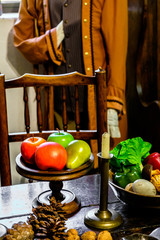 Close-up vegetables and fruits served on the wooden table