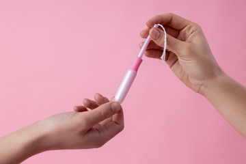 Sharing tampons while having periods stock photo