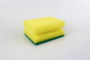 Yellow green kitchen sponge isolated on white background