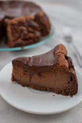 home made sweet chocolate cheesecake on a wooden table