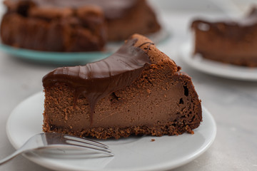 home made sweet chocolate cheesecake on a wooden table