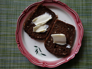 lovely morning Breakfast bread on a white plate on a light green background