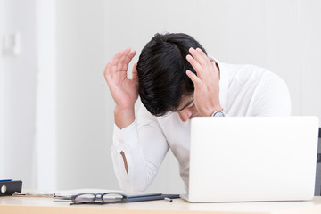 Fototapeta premium A businessman has to work with stressed and unhappy.